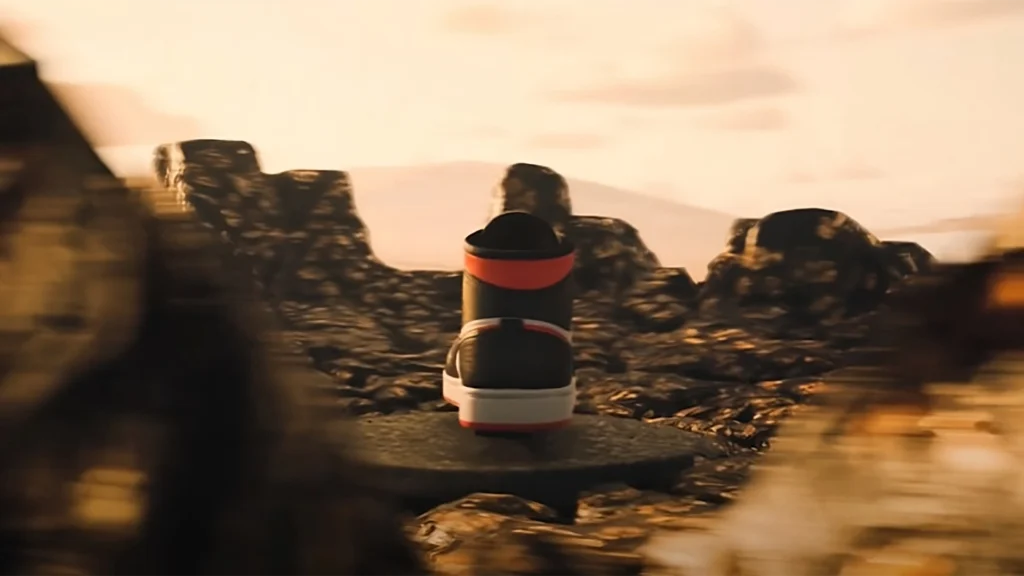 Scarpa Jordan 1 vista da dietro in un ambiente 3D roccioso